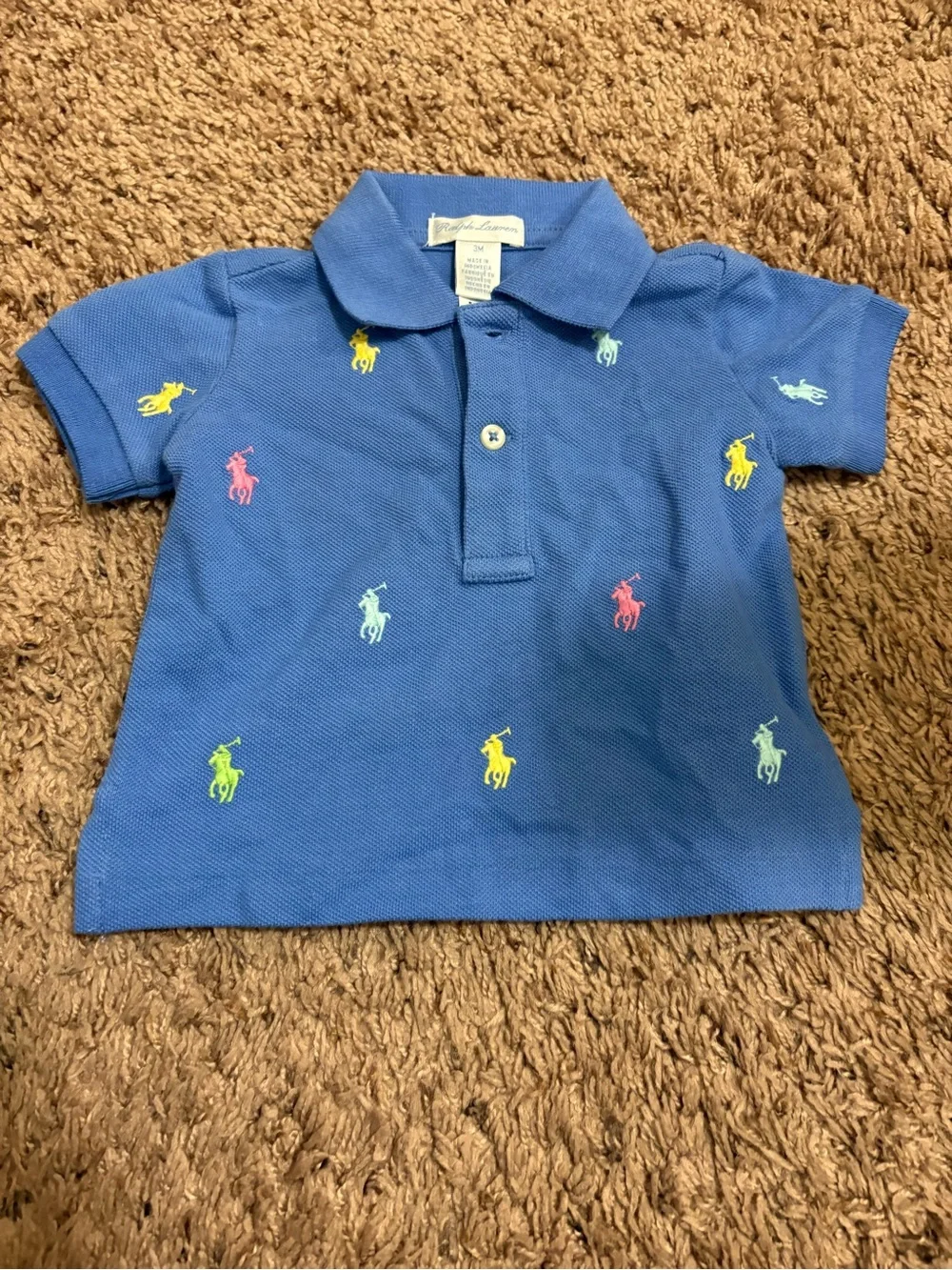 Like new Polo Ralph Lauren light blue polo shirt with colourful logo embroidery